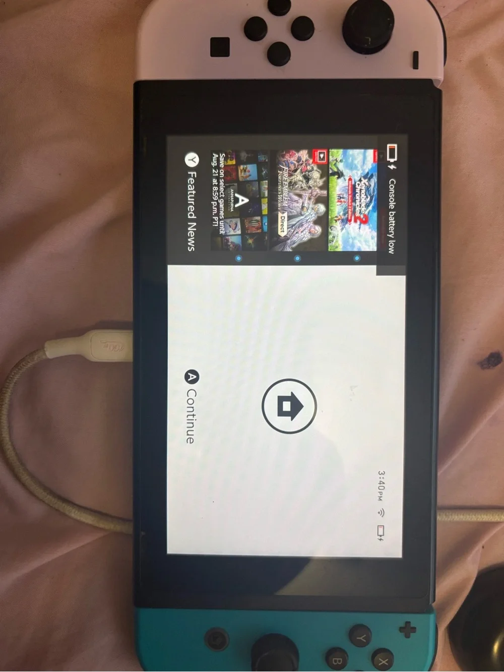 Fully workingNintendo Switch with White Left Joy-Con and Turquoise Right Joy-Con